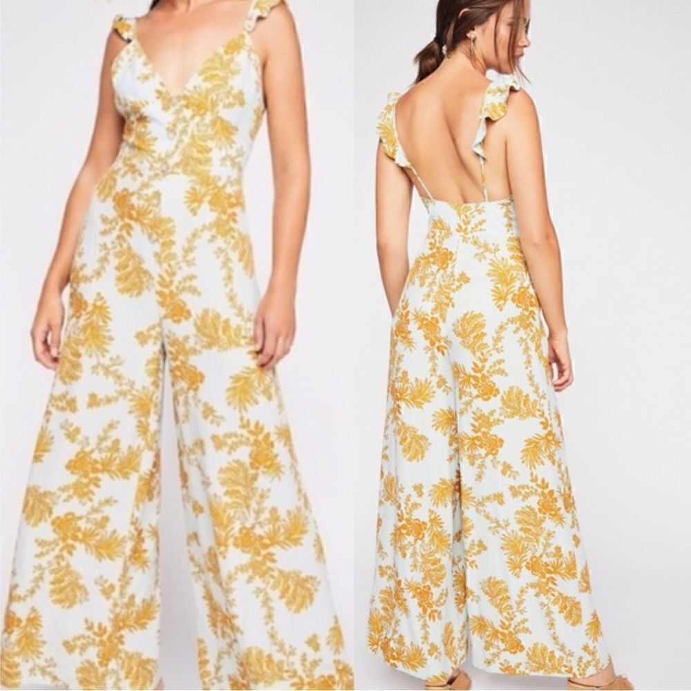 Free people Be the one pastel Blue and Yellow floral jumpsuit size 2